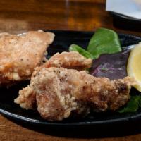 Crispy Chicken · Juicy fried chicken thigh with an original garlic pepper served with mixed baby greens and J...