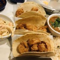3 Piece Sinaloa Fish Tacos · Lightly battered fried or grilled tilapia fish, topped with poblano coleslaw, chipotle mayon...