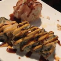 Las Vegas Special Roll · Salmon, crab, avocado, cheese tempura fried with eel sauce spicy mayo.