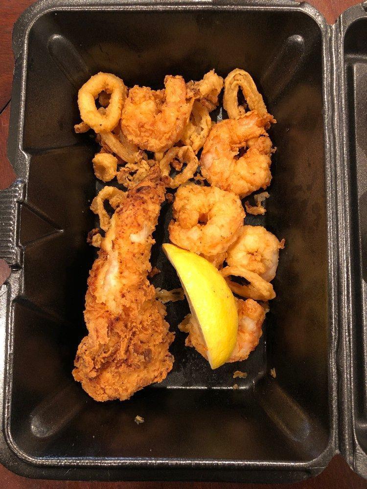 Shrimp Platter · Buttermilk marinated Shrimp, lightly breaded in our Cajun style breading and deep fried to a golden brown perfection. Served with Cocktail Sauce