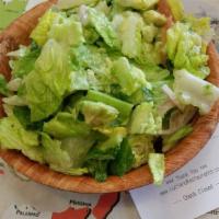 Avocado Salad · A mix of romaine lettuce, fresh sliced tomatoes, avocado, onions, and artichoke mixed with l...