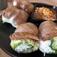 Beef Spring Rolls · Vegan. Shredded green leaves, rice vermicelli noodles, and vegan beef wrap in rice paper. Se...