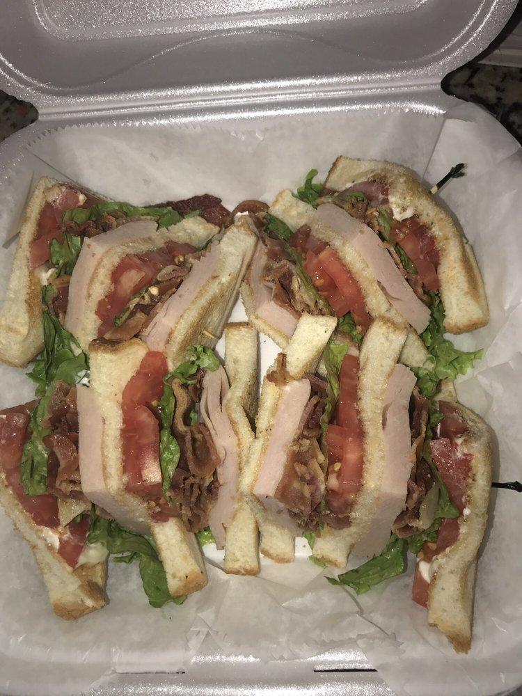 Turkey Club · Roasted turkey breast, lettuce, tomato, bacon and mayonnaise. Served on toasted bread.