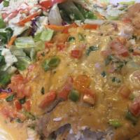 Fish Louisiana · Grilled basa fish on a bed of white rice and topped with Louisiana creamy sauce and shrimp. ...