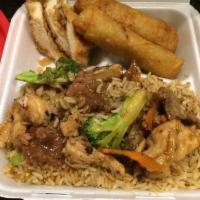 Triple Delight · Marinated beef, shrimp, and chicken sauteed with fresh vegetables in a special hot sauce. Sp...