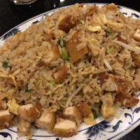 Crispy Chicken Fried Rice · lemon chicken meat cut up stir fried with green onion white onions
 and beansprouts egg