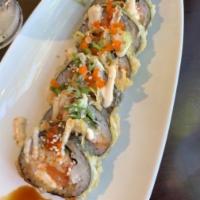 Happy Roll · Spicy salmon, cream cheese, avocado and crab meat, deep fried and topped with tobiko. slight...