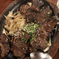 Korean Short Ribs · Beef short ribs marinated in a special Korean onion sauce.