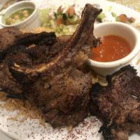 Lamb Chops · 4 juicy pieces of bone-in lamb and charbroiled to perfection.