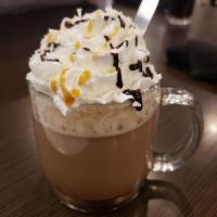 Samoa · Espresso topped with whipped cream and coconut. Drizzled with chocolate and caramel sauce. T...