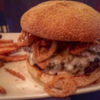 Diablo Burger · choice cajun spiced ground chuck, grilled and topped with bacon, pepper jack cheese, jalapeñ...
