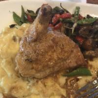 The Zip Chicken · lightly breaded chicken breasts cooked in detroit zip sauce served on roasted garlic mashed ...
