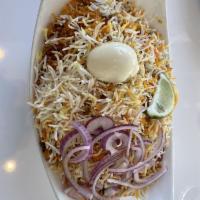 Chicken Biryani · Blended with herbs and spices, then garnished with egg, onion and lemon. Served with yogurt ...