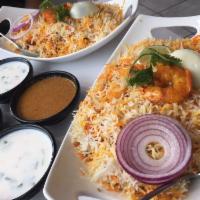 Shrimp Biryani · Blended with herbs and spices, then garnished with egg, onion and lemon. Served with yogurt ...