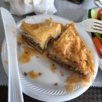 Baklava · Flaky, Greek dessert made of tissue-thin fillo pastry, layered with ground walnuts and honey.