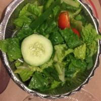 Garden Salad · Romaine lettuce, tomatoes, cucumbers, hot and green peppers, onions and black olives. Balsam...