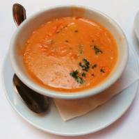 Lobster Bisque · A light cream lobster bisque with a touch of sherry
