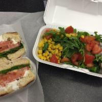 Smoked Salmon Bagel · Smoked salmon, capers, cream cheese, tomato, red onion and arugula