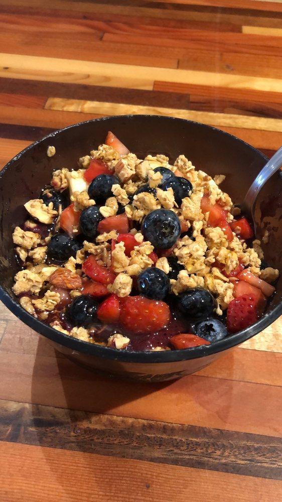 Acai Bowl · Acai blended with strawberries, blueberries, bananas, and apple juice. Topped with bananas, blueberries, strawberries, apple, granola, and honey.