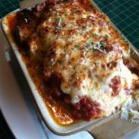 Meat Lasagna · House Bolognese, spicy Italian sausage, mozzarella, ricotta, fresh Parmigiano.
