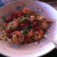 Shrimp Scampi · Marinated shrimp, tomato, shallots, white wine, butter, angel hair, garlic, basil.
