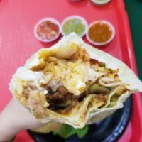 Burrito Los Cabos · Choice of meat, cheese, guacamole, sour cream, salsa fresca, piquin sauce.