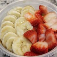The Gorilla Bowl · Organic Granola, Banana, Strawberries, Almond Butter or Peanut Butter.