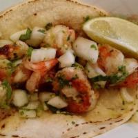 2 Taco Gamba · Sauteed shrimp in a soft corn tortilla, chopped onion and cilantro with hot or mild sauce.