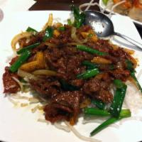 Mongolian Beef · Sliced tender beef marinated in a special Mandarin savory sauce, quickly cooked with green o...