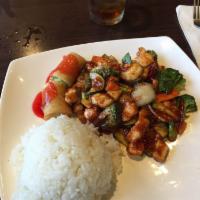 Szechuan Chicken · Slices of chicken breast combined with vegetables sautéed in a unique Mandarin sauce, spicy,...