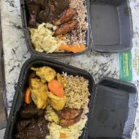 Jerk Chicken Meal · served with rice and peas, steamed cabbage and fried sweet plantains