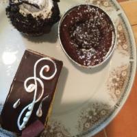 Tiramisu · Vanilla cake, tiramisu mousse filling, ladyfingers, and cocoa.