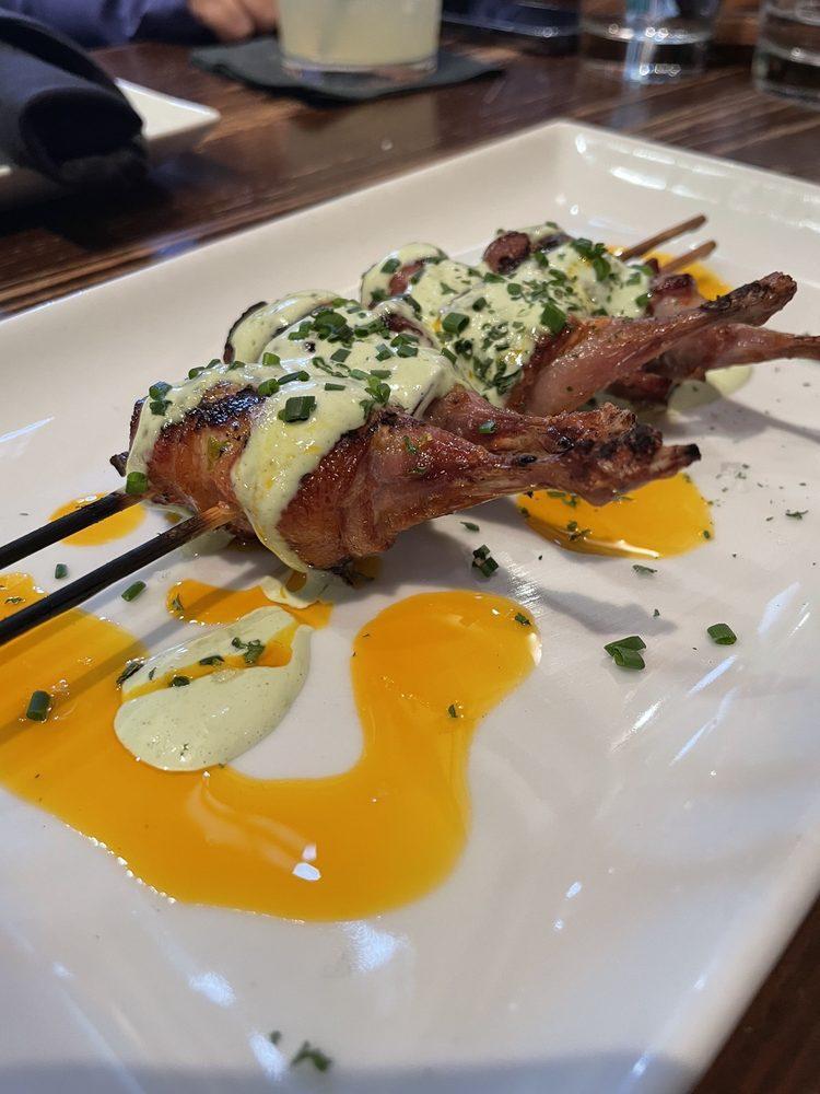 Bacon Wrapped Quail Poppers · Pickled jalapeno and house green goddess.