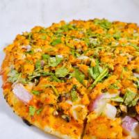 Butter Chicken Pizza · Masala Marinated Chicken, Red Onions, Bell Peppers, Mushrooms, Garlic with Creamy Curry Butt...