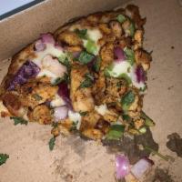 Chicken Tikka Pizza · Chicken tikka. Masala marinated chicken, red onions, bell peppers, fresh cilantro with mozza...