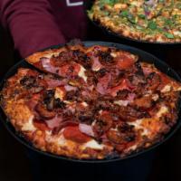 Gladiator Pizza · Pepperoni, sausage, Canadian bacon, salami, beef, linguica, bacon, mozzarella cheese and red...
