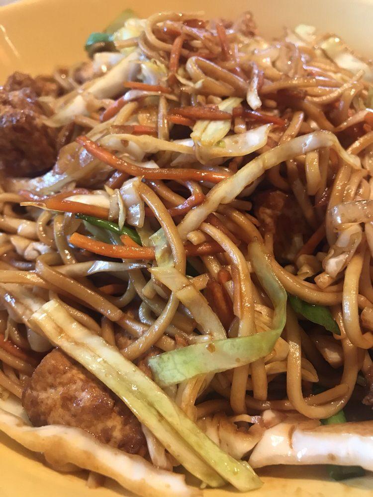 Blazing Noodles · Noodles with chili seared soy sauce, scallions, cabbage, carrots, bell peppers, and onions.
