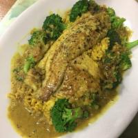 Coconut Curry Tilapia · Served with brown rice and broccoli. 