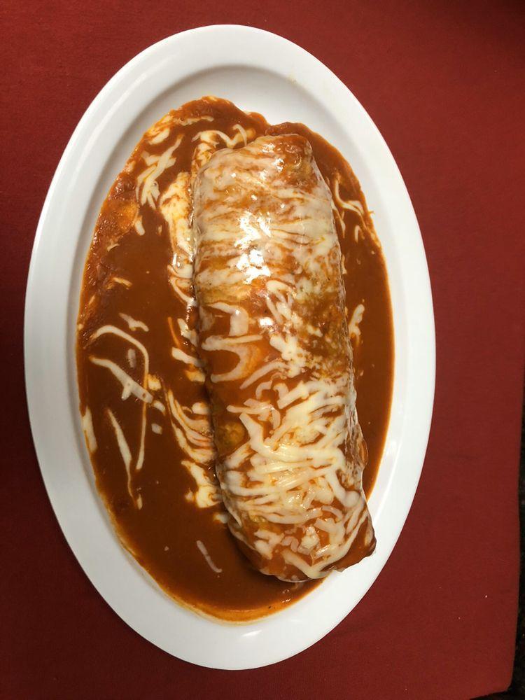 Wet Burrito · Choice of meat with rice, beans, sour cream, guacamole and pico de gallo salsa topped with red sauce and cheese.