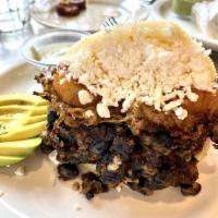 Pabellon Arepa · Shredded beef, black beans plantains and cheese.