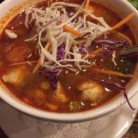 Tom Yum · Spicy sour soup. Authentic Thai soup with Thai chili paste, fish sauce, mushrooms, tomatoes,...
