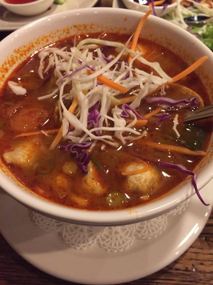 Tom Yum · Spicy sour soup. Authentic Thai soup with Thai chili paste, fish sauce, mushrooms, tomatoes, kaffir leaves, lemongrass, cilantro, and your choice of chicken, vegetable or tofu.