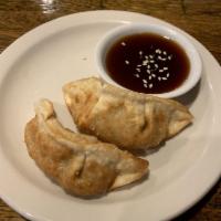 Pot Sticker · 6 pieces. Pork or vegetable. Crispy, fried or steamed. Served with house sweet sauce.