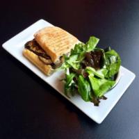 Eggplant Sandwich · Roasted herbed eggplant, roasted tomatoes and arugula spread on ciabatta roll.