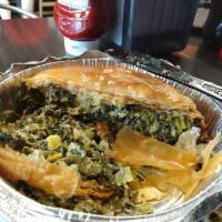 Spinach Pie · Flaky phyllo pastry filled with spinach, feta and herbs.