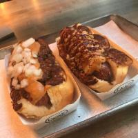 Cowboy · Smoked bacon wrapped dog, cheddar cheese sauce, crispy onions, and BBQ sauce. Hormone and an...