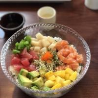 Hawaiian Bowl · Green mix, sushi rice, furikake fresh salmon, tuna and escolar, mango, avocado, jalapeno and...