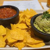 Chips with Fresh Salsa and Guacamole · Made in-house.