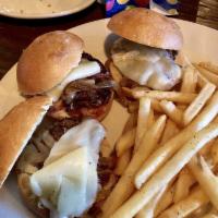 Filet Sliders Sandwich · 3 mini filet sliders topped with grilled onions and provolone cheese. Served on mini brioche...