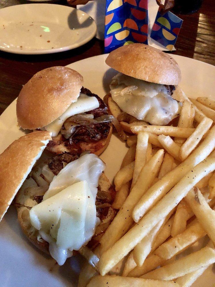 Filet Sliders Sandwich · 3 mini filet sliders topped with grilled onions and provolone cheese. Served on mini brioche buns.